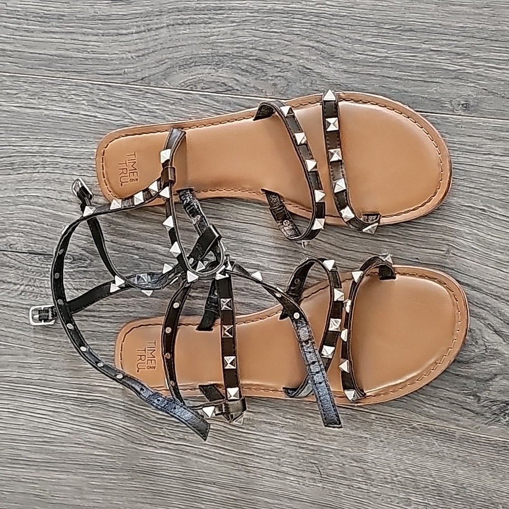 Black and brown studded sandals